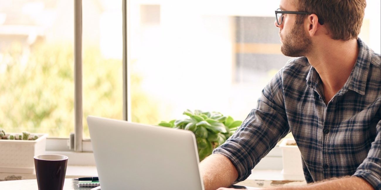 20151120172744-procrastination-young-man-home-office-laptop-distracted-work-distant